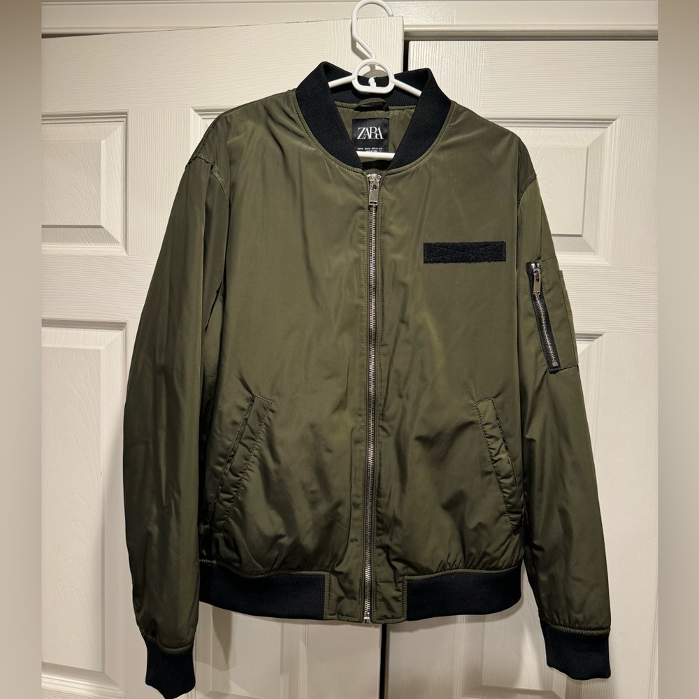 Men’s Olive Bomber Jacket With Black Knit Collar and Cuffs.